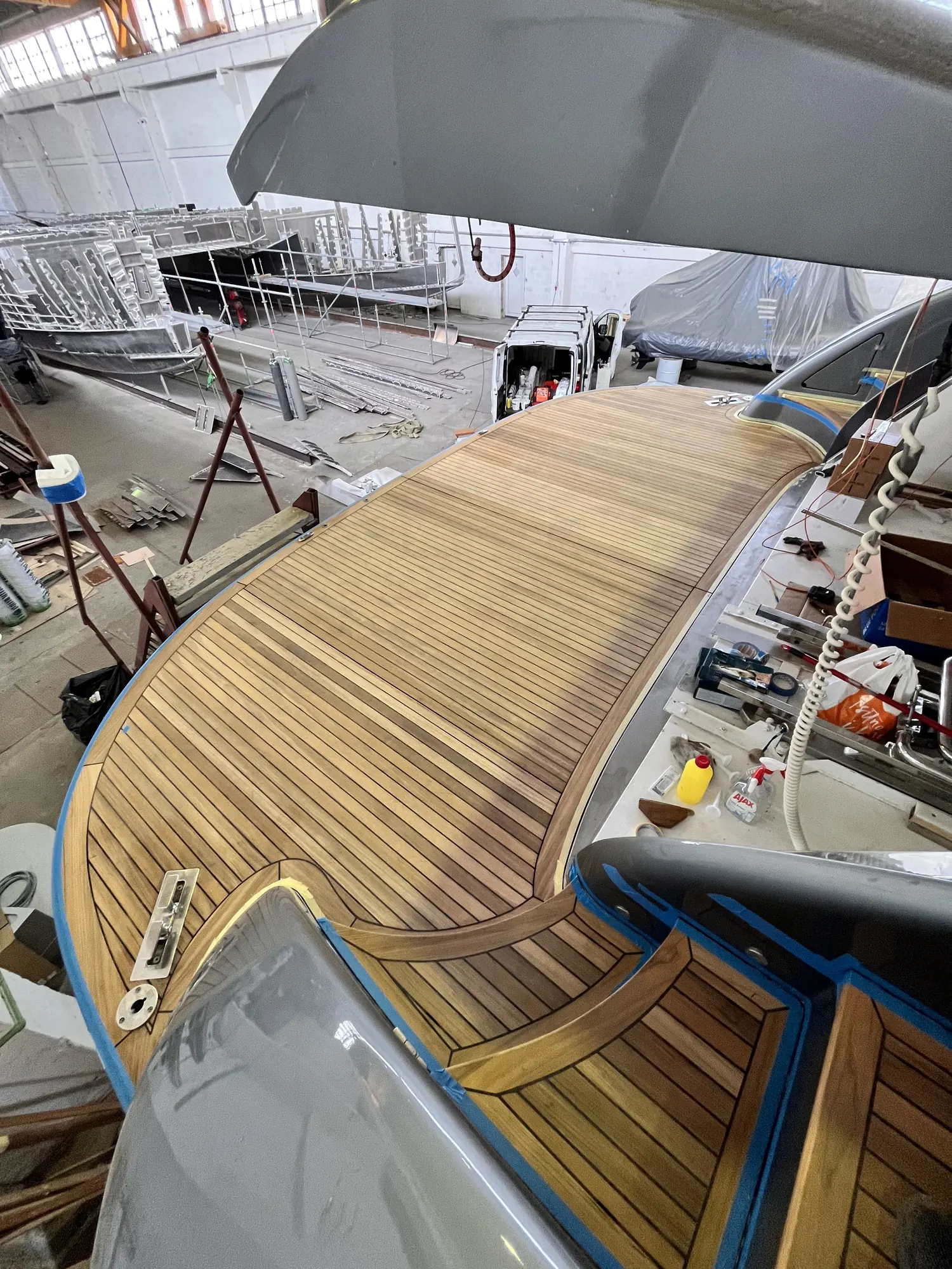 AB 92 teak deck: foredeck being laid, in the shed