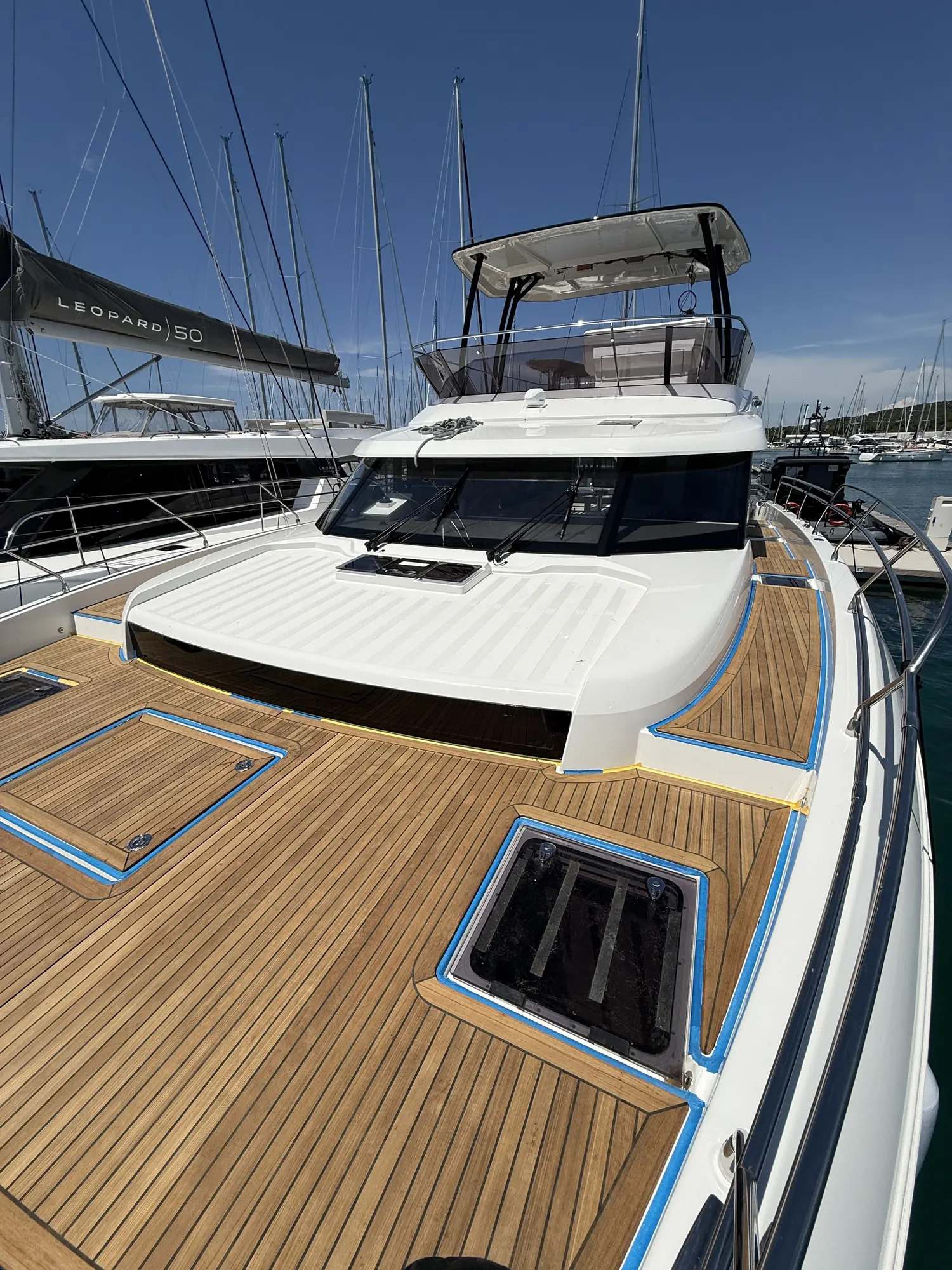 Prestige M48 teak deck: foredeck, tape still on