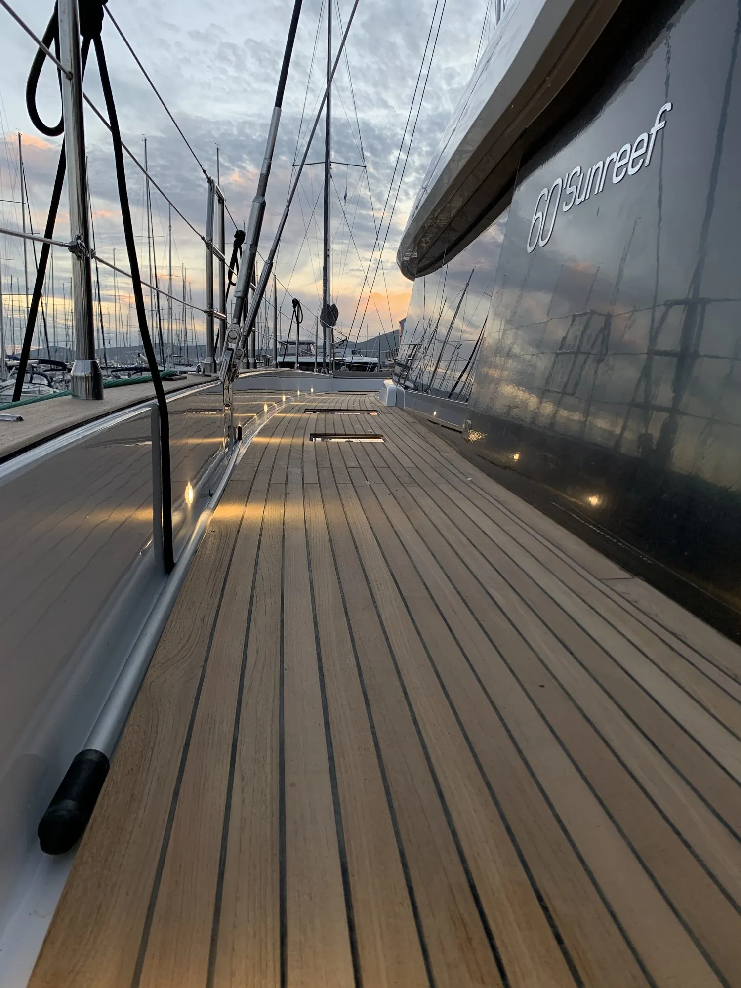 Sunreef 60 teak side deck at dusk